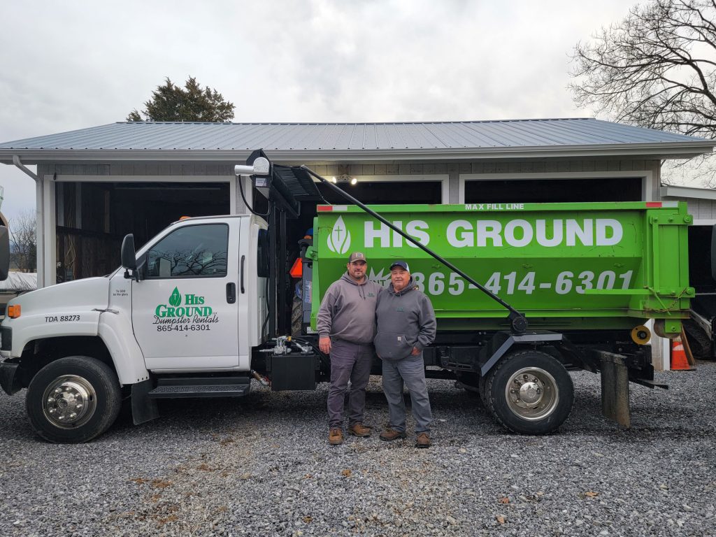 His Ground owner John and son Josh in front of dumpster rental truck